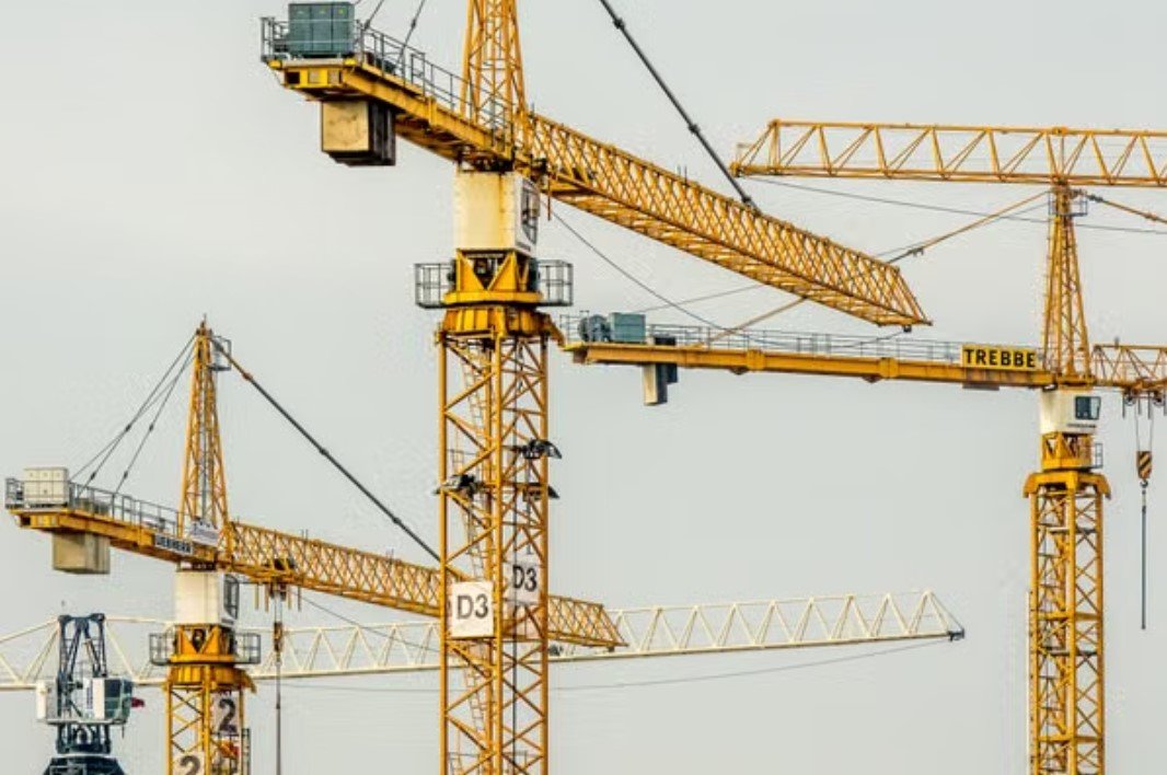 Construction crews working on infrastructure and building projects
