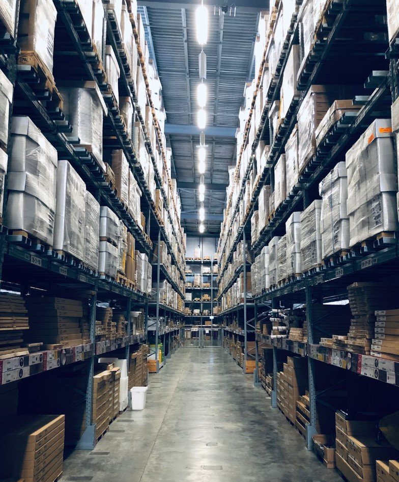 Warehouse staff handling goods for storage and distribution